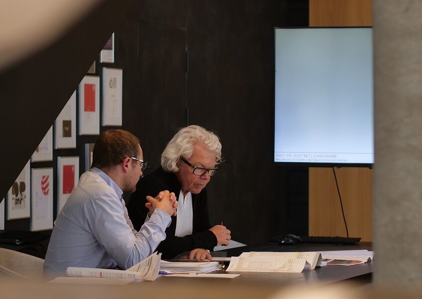 Lighting Design with Uli Sattler and Team Uli Sattler in a lighting design meeting with a colleague, discussing drawings and concepts