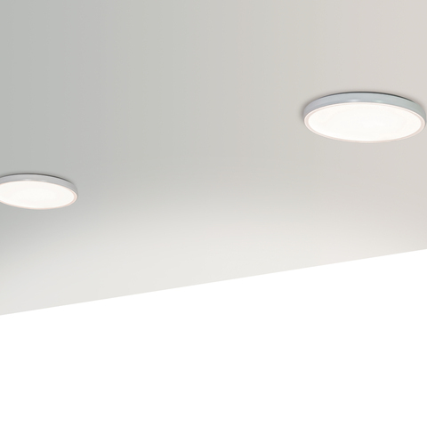 Fixed flat round downlight White ceiling with two flat, round ceiling downlights AVVENI DOWNLIGHT PURE, with white edge and circular prismatic diffuser.