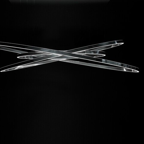 Elliptical pendant light available in 3 sizes Elliptical ring lights Doppio Ellipse in three sizes suspended from each other with a polished aluminium finish.