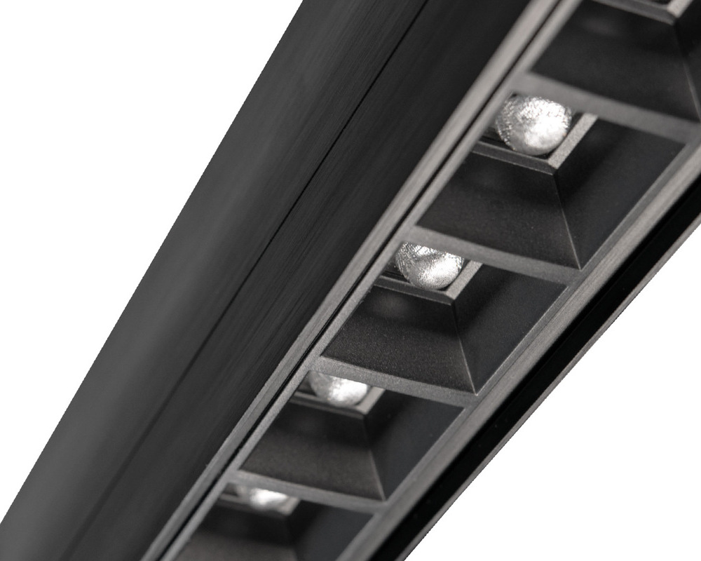 PALADIO LENS 54 diffuser: Mini lens reflector (segmental) Black linear luminaire PALADIO LENS 54 with a view of the diffuser, which consists of several small square mini lenses.