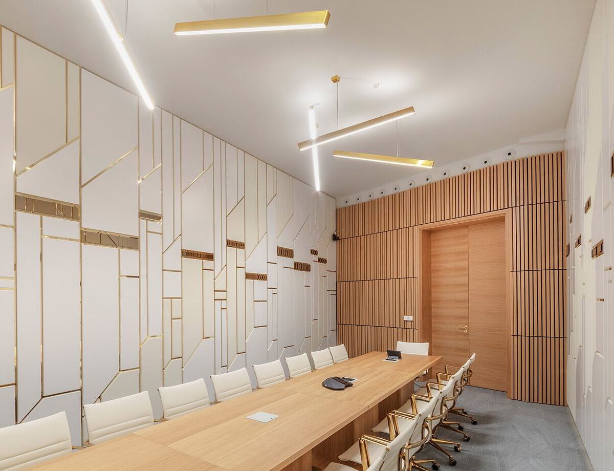 Postpalast Budapest - Featuring Paladio Prism 1410 by Sattler Modern conference room in the Postpalast, Budapest, with geometric wall designs and Sattler's Paladio Prism 1410 lighting fixture.