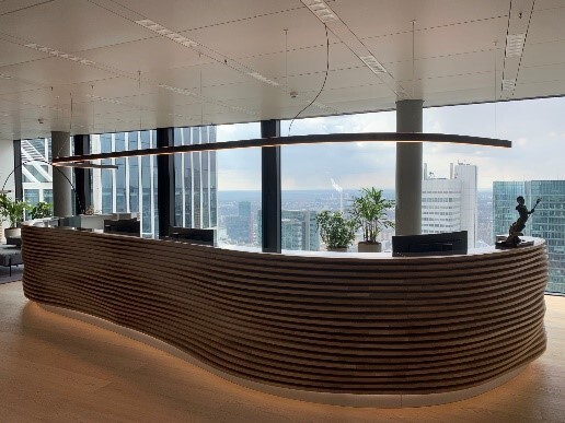 Omni Tower Frankfurt – Pendant Lights in Reception Reception area Omni Tower Frankfurt with linear pendant lights