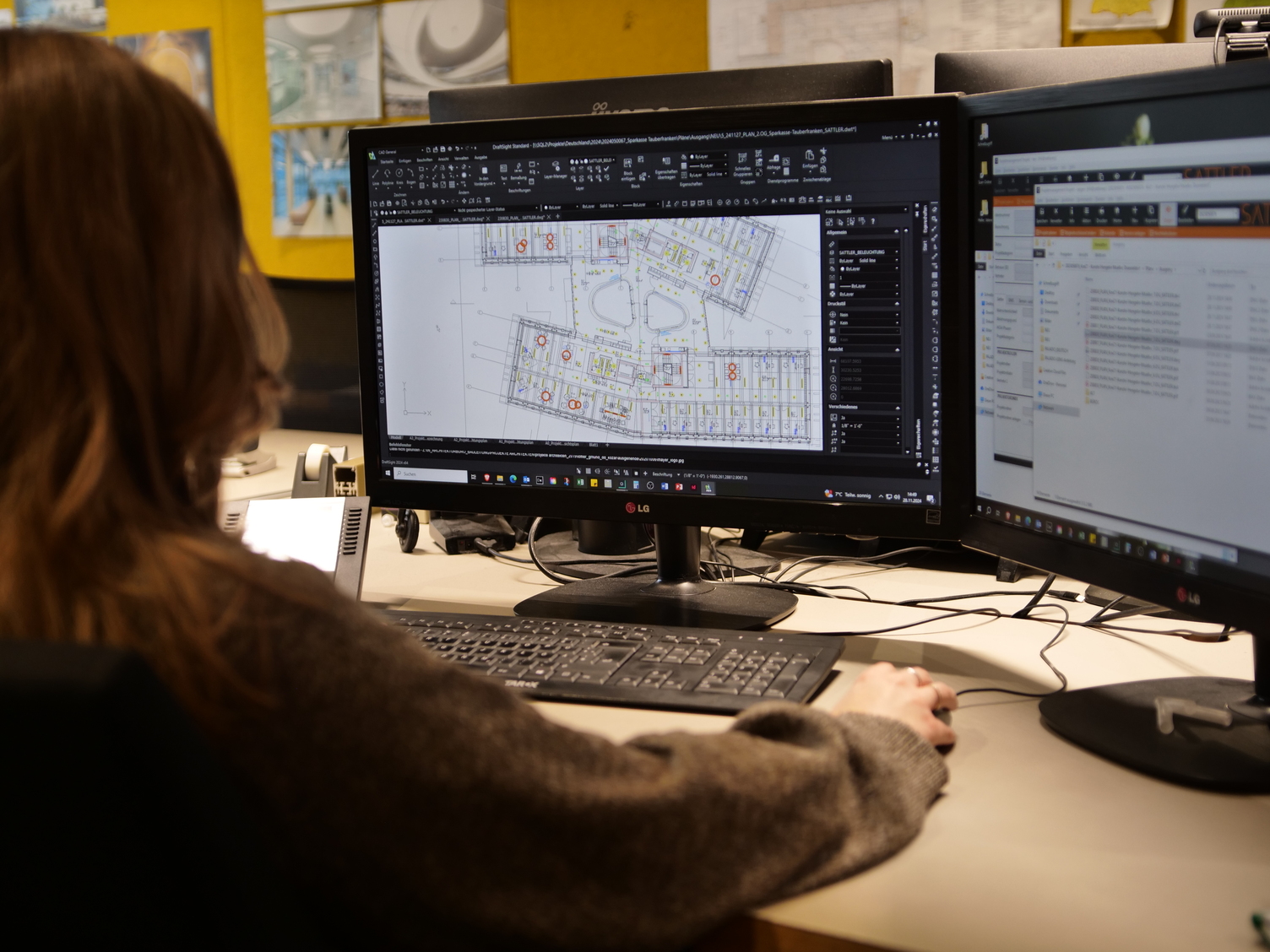 SATTLER Lighting Design: Colleague Working with DIALux SATTLER colleague working with DIALux lighting design software on floor plan